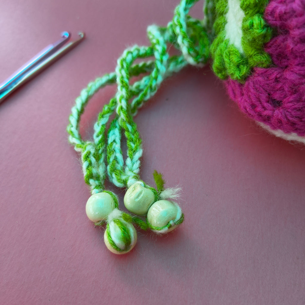 Floral Potli Bag – White & Dark Pink Crochet Purse with Green Flowers