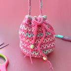 Pink Multicolor Potli Bag – Handmade Crochet Festive Purse